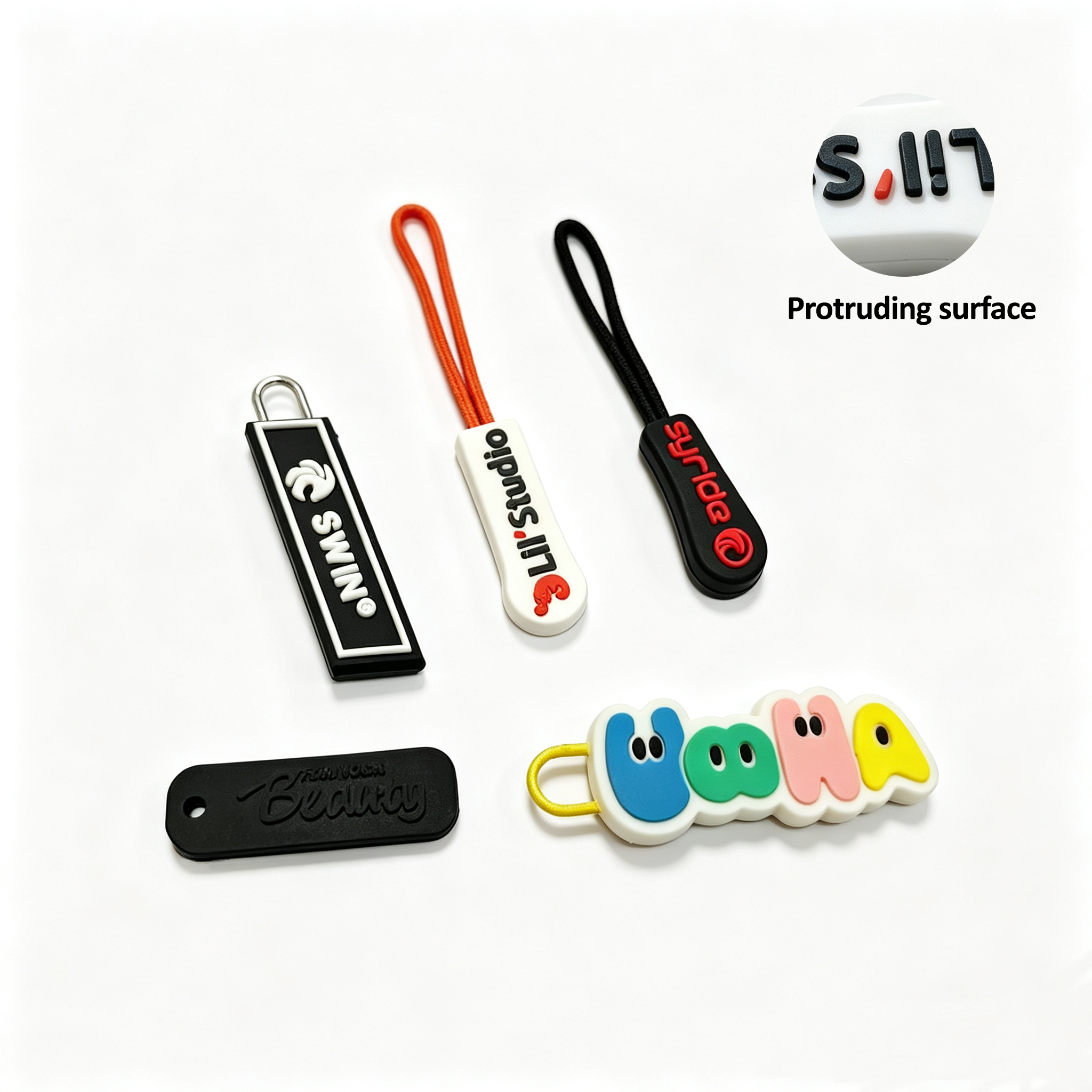 raised PVC zipper puller with multiple solid colors but no gradient color